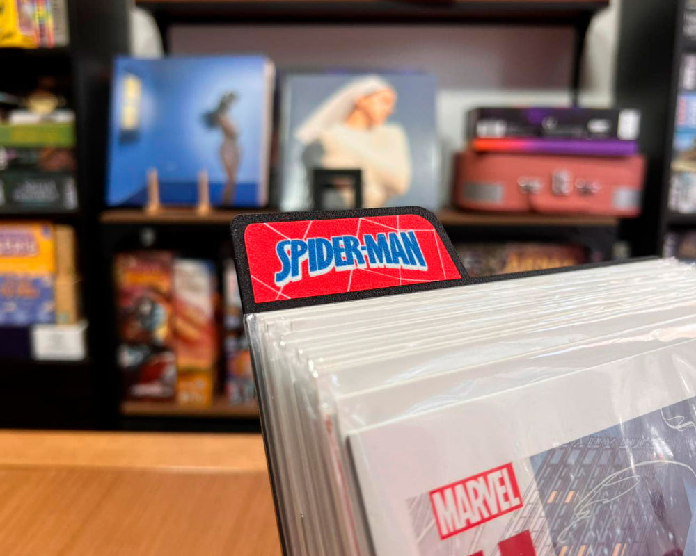 cajas comics grapas aracnidos ucm marvel almacenaje spiderman separador